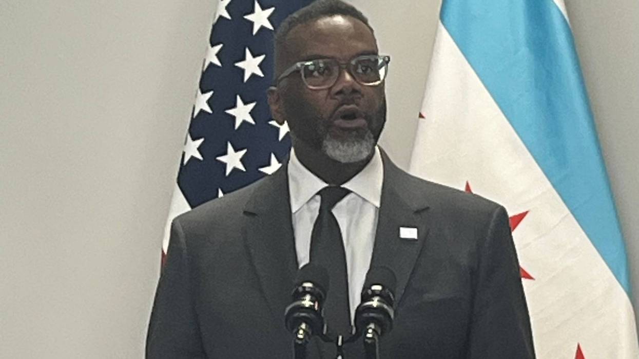 Chicago mayor Brandon Johnson speaks to reporters at City Hall.