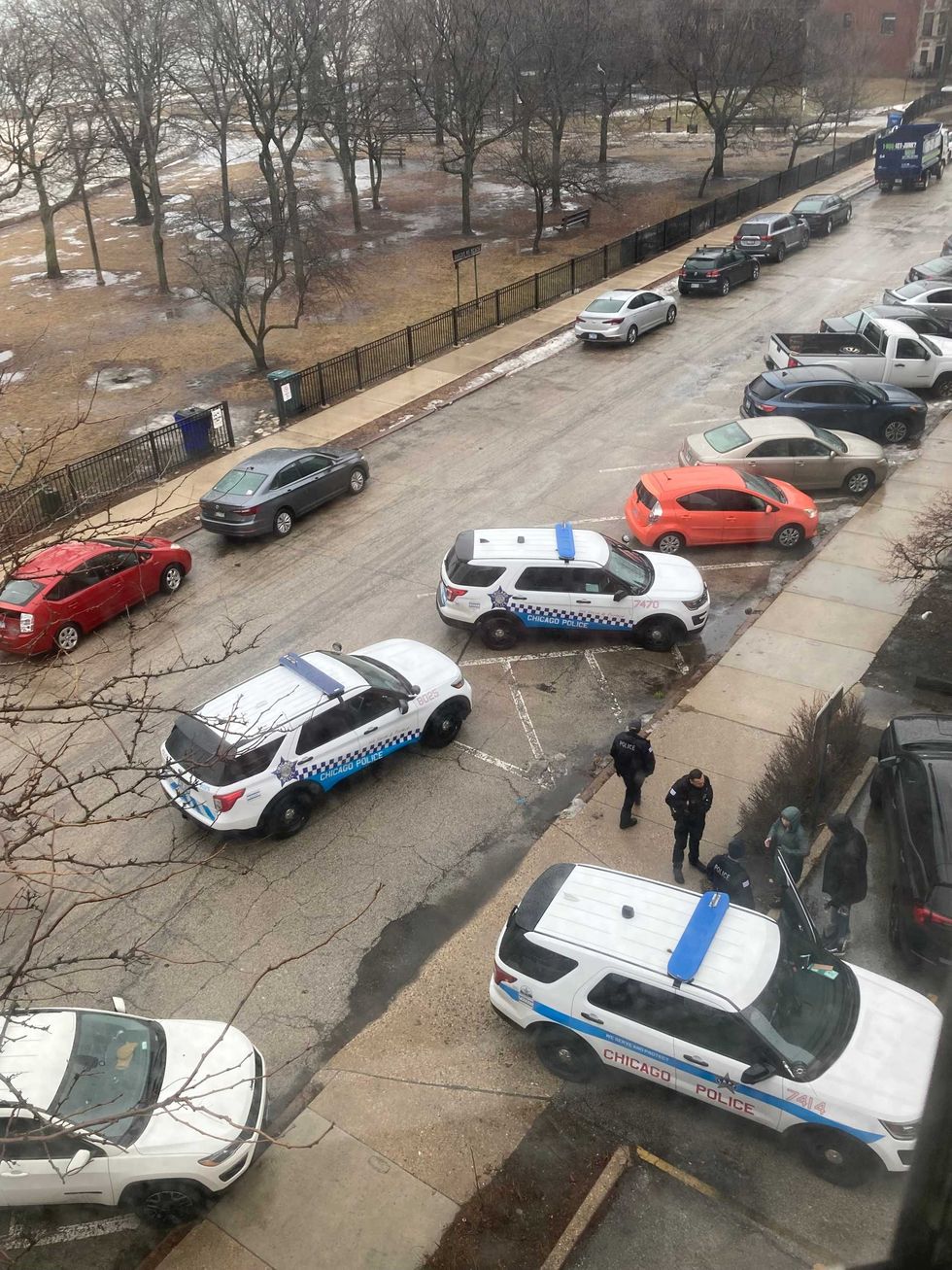 Chicago Police Department officers respond to a carjacking in February 2022.