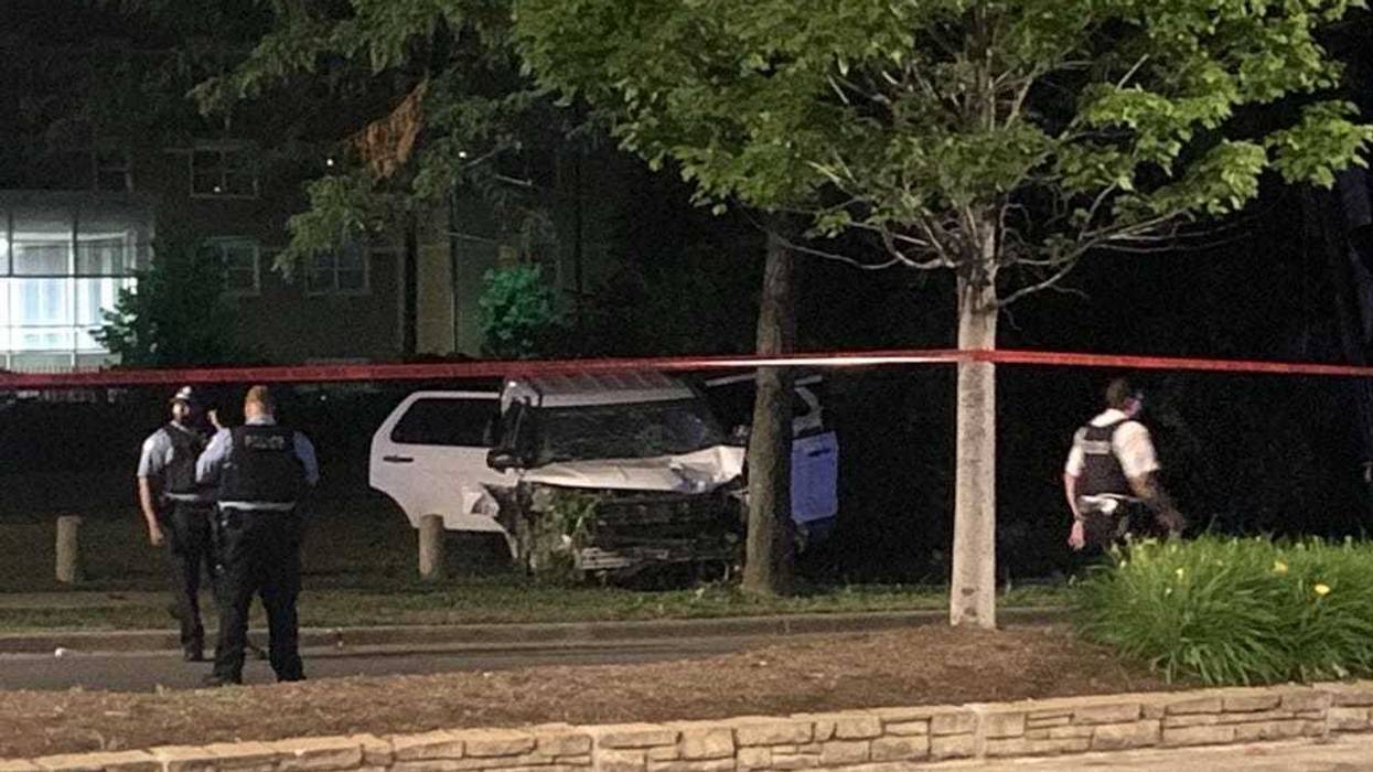 Chicago police investigate a scene where a man on a motorized scooter was fatally struck by an unmarked CPD vehicle July 8, 2020, in the 11800 block of South Halsted Street.