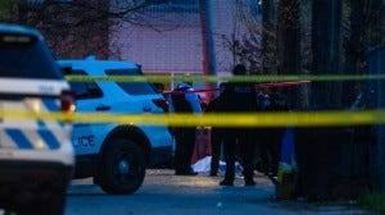 Chicago Police investigate the scene where a man was shot and killed, Sunday morning, in the 1200 block of South Komensky, in the Lawndale neighborhood.