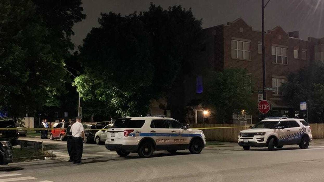 Chicago police investigate the scene where an off-duty officer and a woman were found unresponsive in the 3900 block of West Ainslie, Tuesday, June 9, 2020.