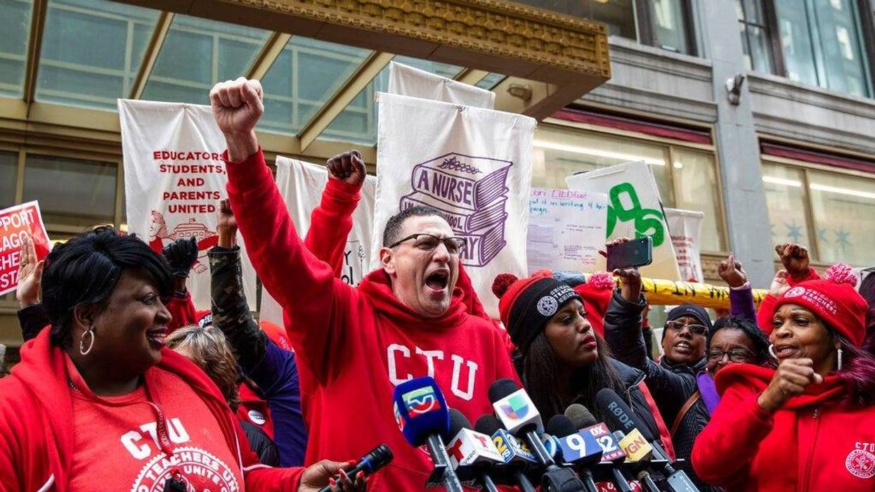 Chicago Teachers Union President Jesse Sharkey speaks during a rally outside Chicago Public Schools headquarters in the Loop, before marching through downtown with thousands of striking union members and their supporters, Thursday, Oct. 17, 2019