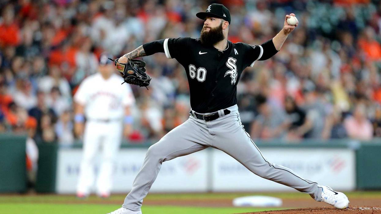 Chicago White Sox starting pitcher Dallas Keuchel (60) delivers a pitch against the Houston Astros during the first inning at Minute Maid Park.