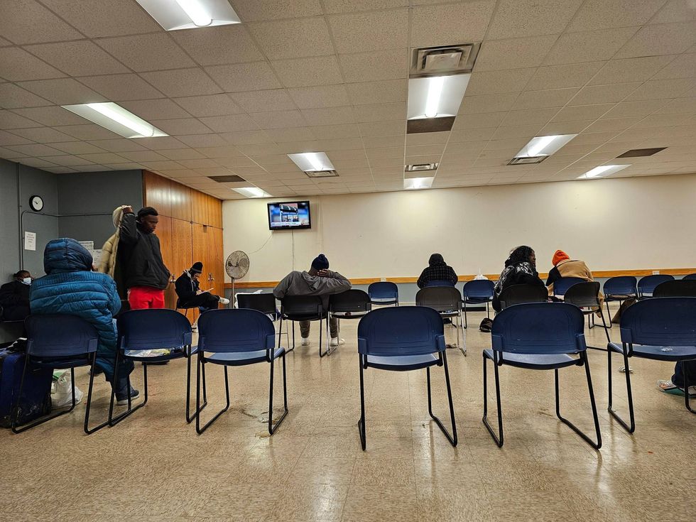 Chicagoans warm up at the Garfield Community Service Center, one of several warming areas the city opened as dangerously cold temperatures gripped Chicago.