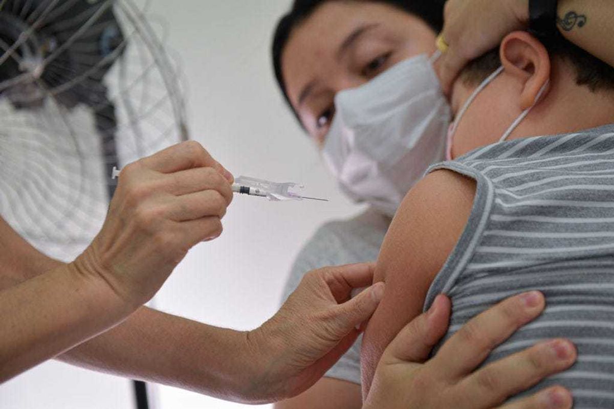 child getting a vaccine shot