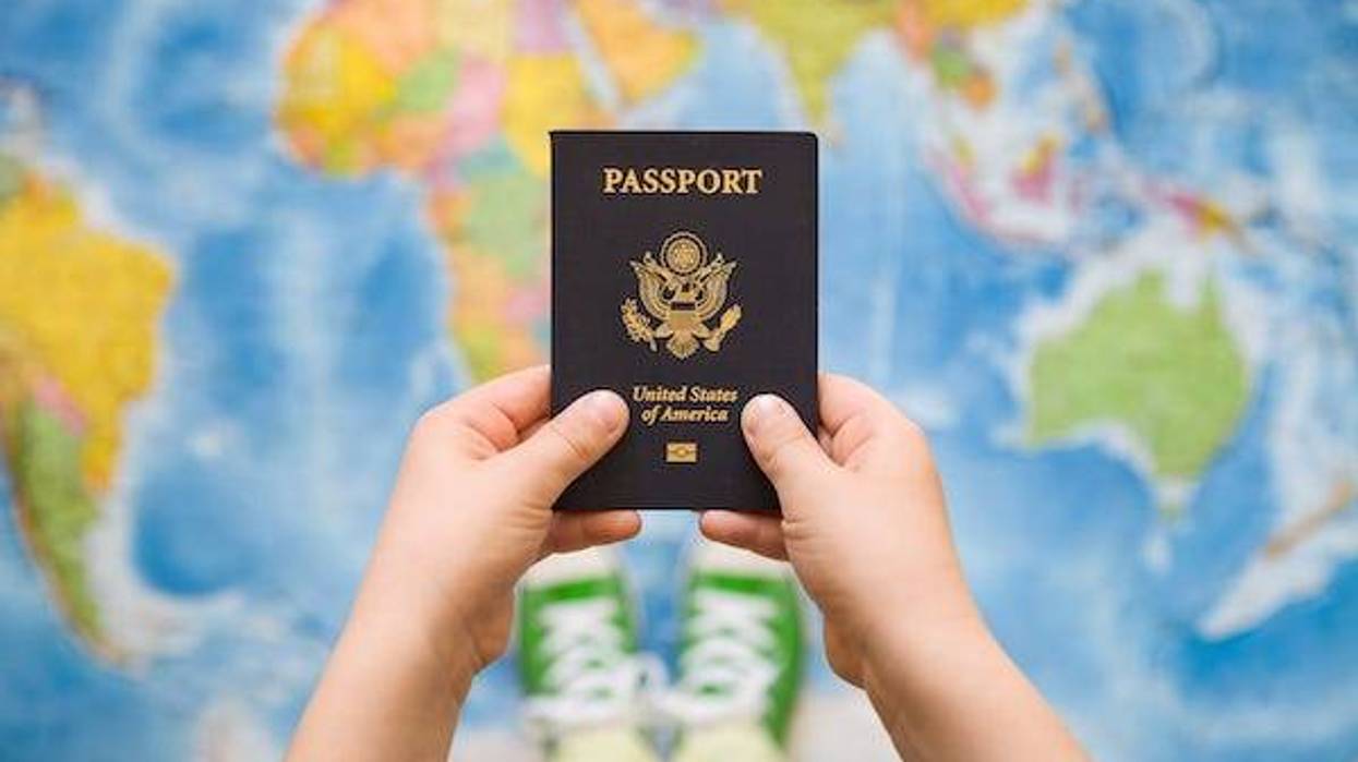 Child holding a US passport