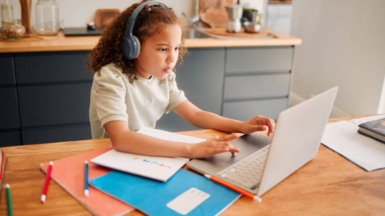 child learning remotely