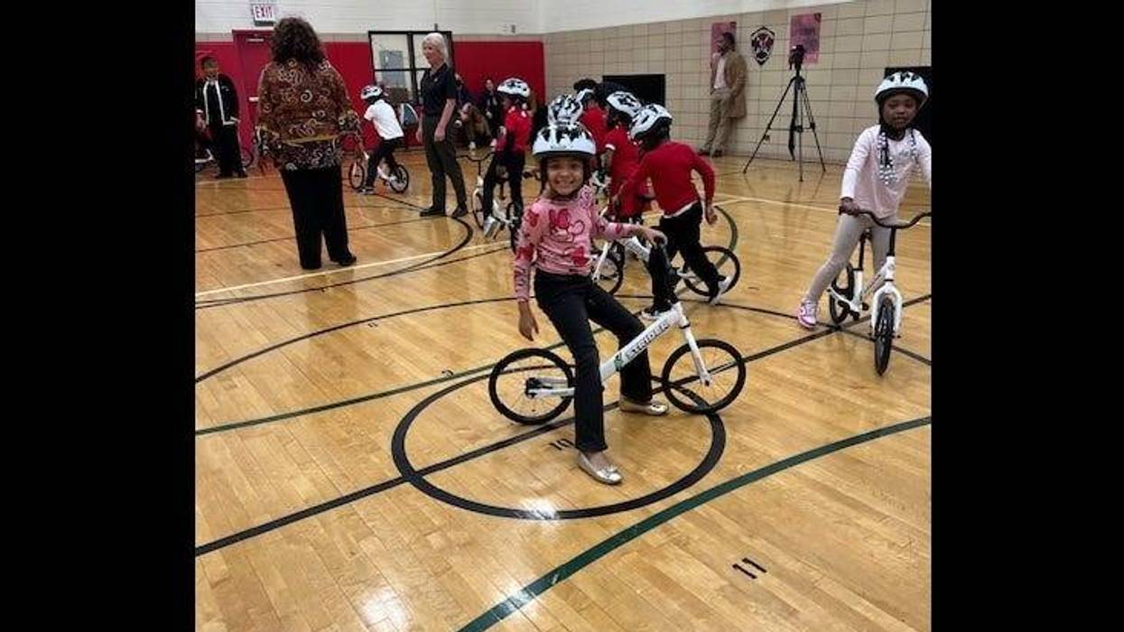 child riding bicycle