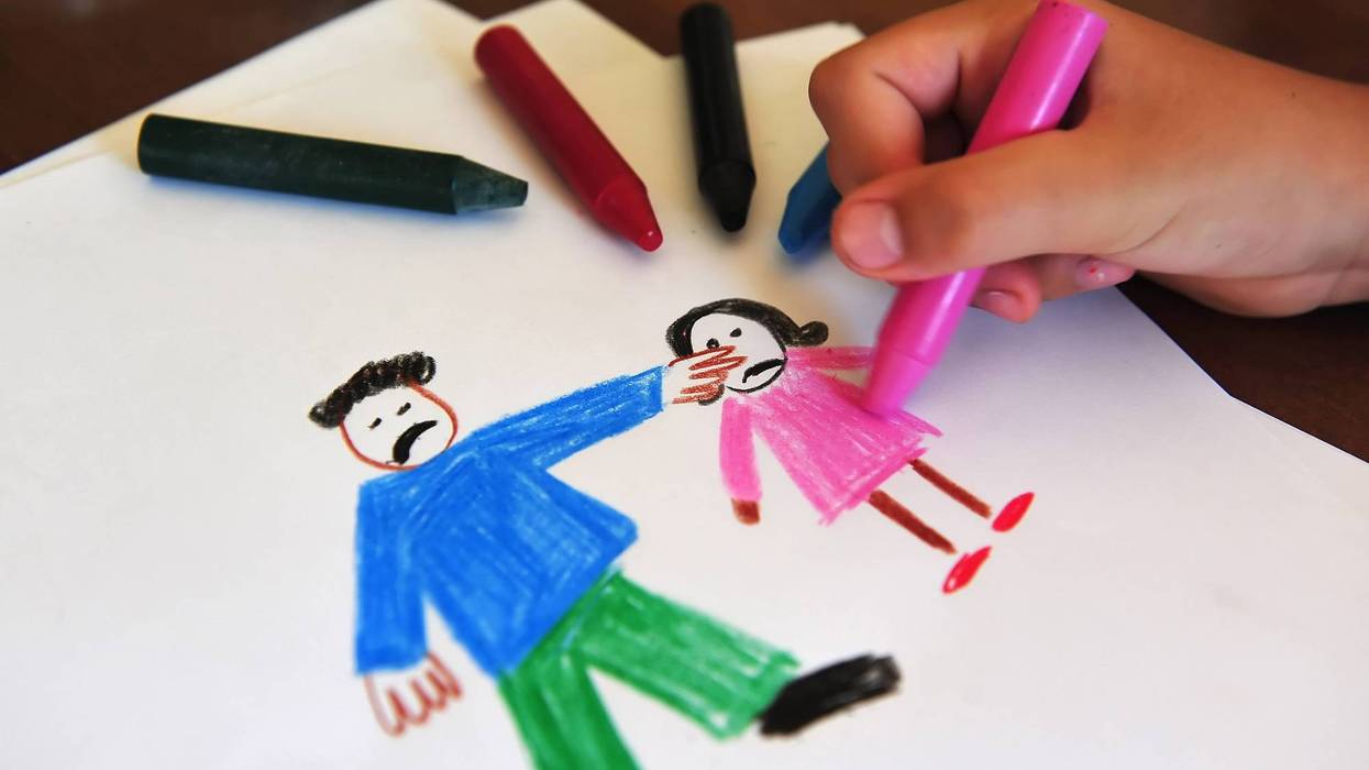 child's drawing of man hitting girl