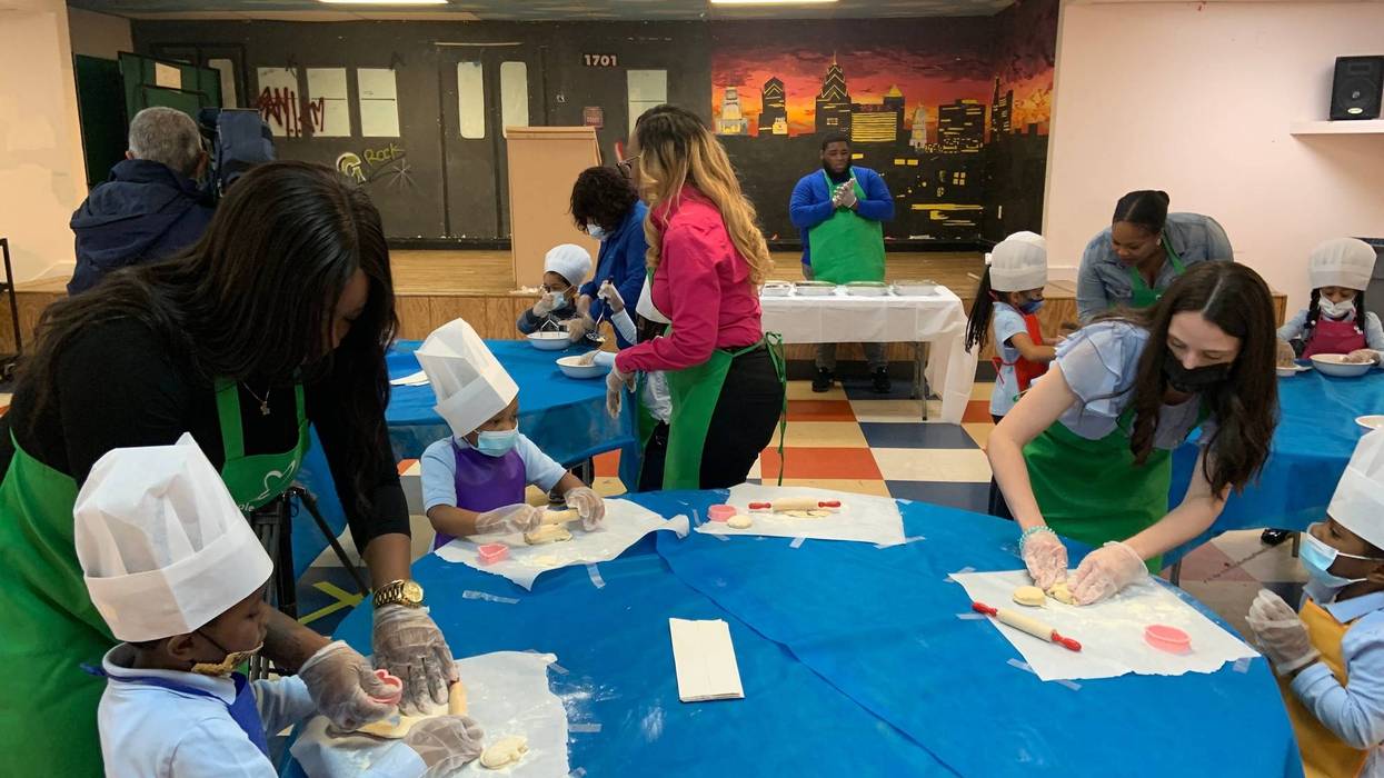 Children rolling dough at the R.W. Brown Boys and Girls Club in North Philadelphia.