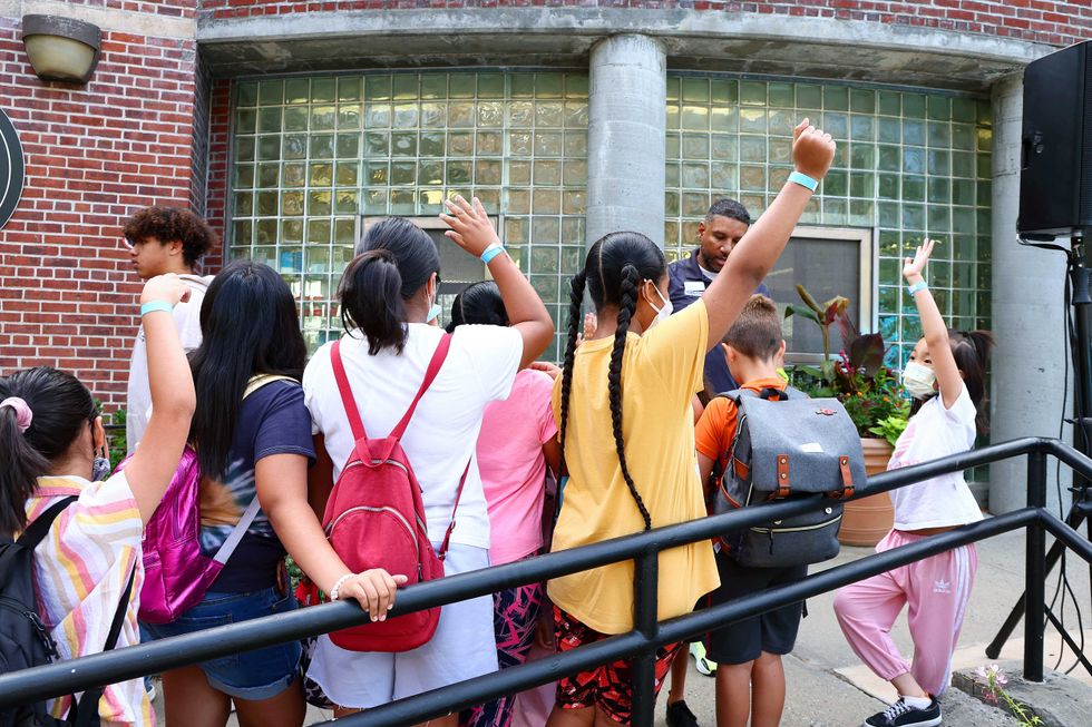 Children take part in a back-to-school event in New York City in July