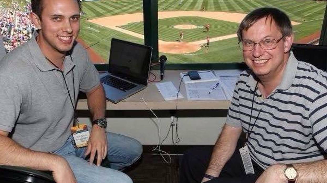 Chris Blake, left, and John Blake, right, before a Texas Rangers' spring training broadcast in Tempe, Arizona.