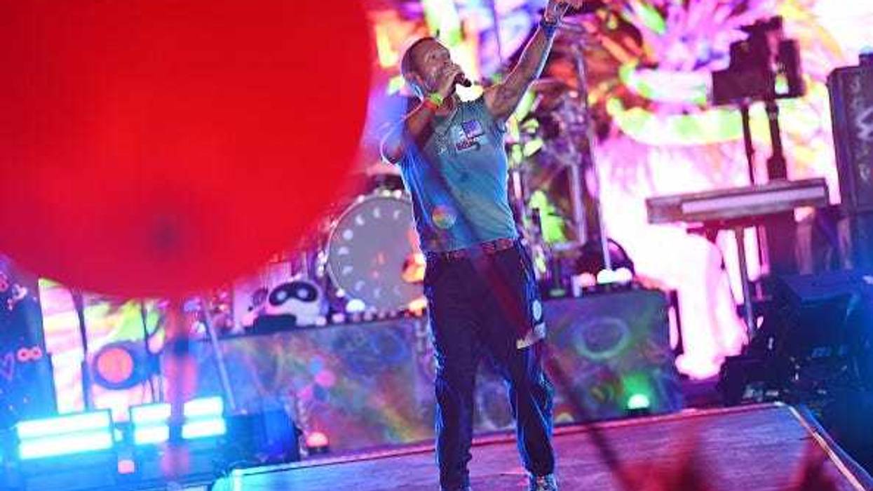 Chris Martin of the band ColdPlay perform on stage during day four of Glastonbury Festival 2024 at Worthy Farm, Pilton on June 29, 2024 in Glastonbury, England. Founded by Michael Eavis in 1970, Glastonbury Festival features around 3,000 performances across over 80 stages. Renowned for its vibrant atmosphere and iconic Pyramid Stage, the festival offers a diverse lineup of music and arts, embodying a spirit of community, creativity, and environmental consciousness. (Photo by Joe Maher/Getty Images)