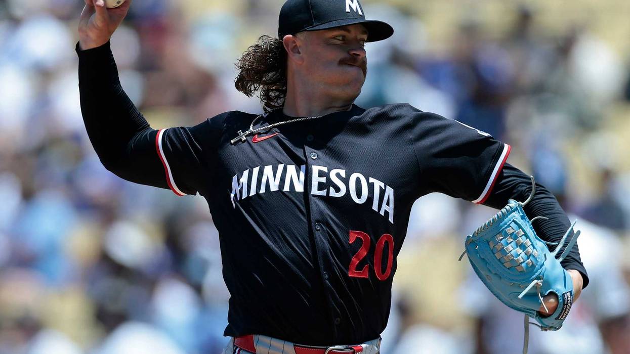 Chris Paddack #20 of the Minnesota Twins throws against the Los Angeles Dodgers in the first inning at Dodger Stadium on July 23, 2025 in Los Angeles, California.