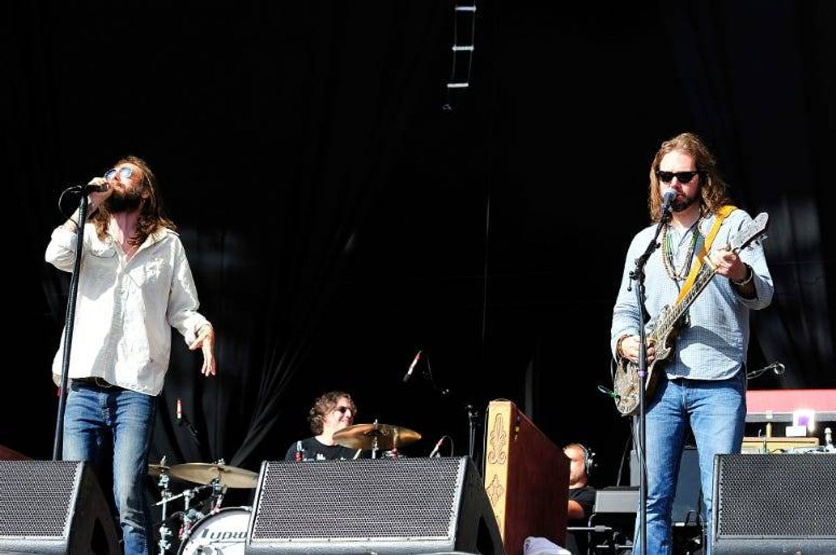 Chris Robinson (L) and Rich Robinson of the Black Crowes perform at Hard Rock Calling Day