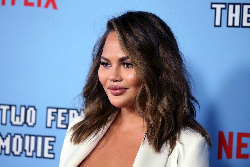 Chrissy Teigen explains why her family travels with late son's ashes: 'He is going to stay with us'