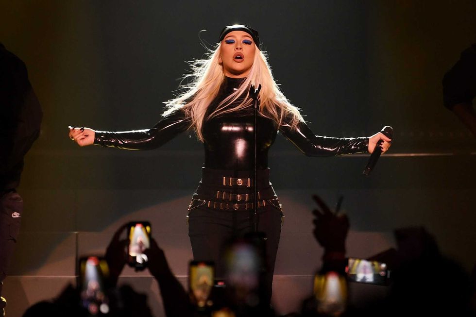 Christina Aguilera 'Stripped' topless to promote her next performance