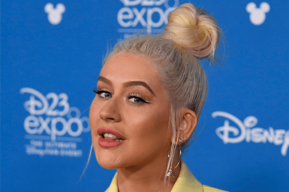 See Christina Aguilera celebrate New Year's Day with nearly-naked bath tub toast