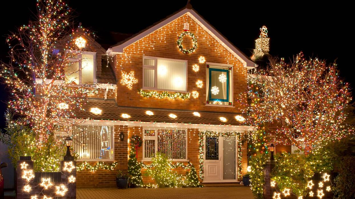 Christmas Lights outside on a house and in the garden