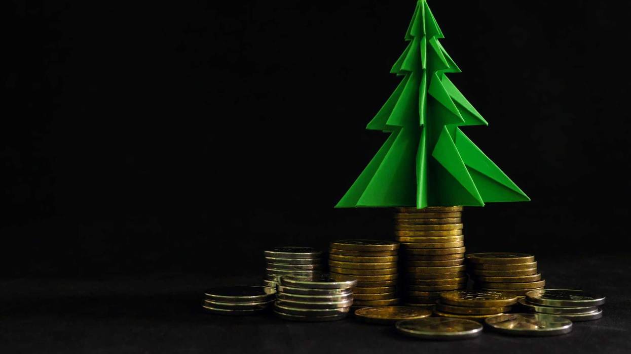 Christmas tree on top of coins.