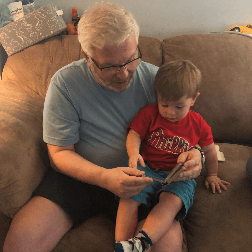 Chuck Swanson with his grandson, the fifth generation of Philadelphia sports fans.