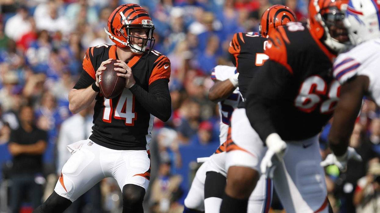Cincinnati Bengals quarterback Andy Dalton (14) looks to throw a pass during the first half against the Buffalo Bills at New Era Field.