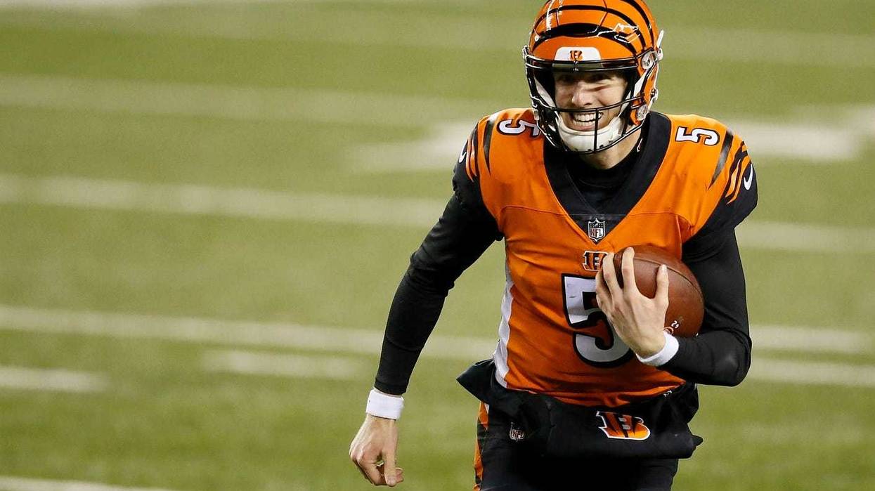 Cincinnati Bengals quarterback Ryan Finley (5) runs on a QB keeper in the second quarter of the NFL 15 game between the Cincinnati Bengals and the Pittsburgh Steelers at Paul Brown Stadium in downtown Cincinnati on Monday, Dec. 21, 2020.