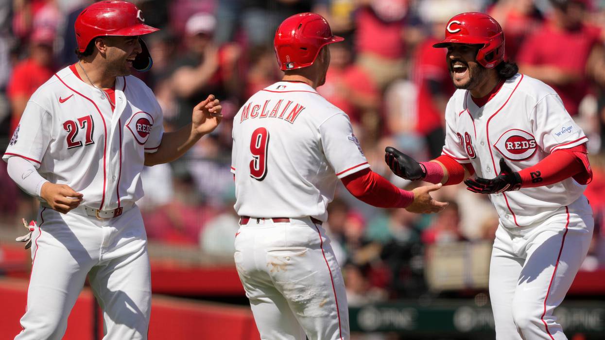 Eugenio Suarez hits a 3-run homer and Reds beat Red Sox 3-2 to win season-opening series