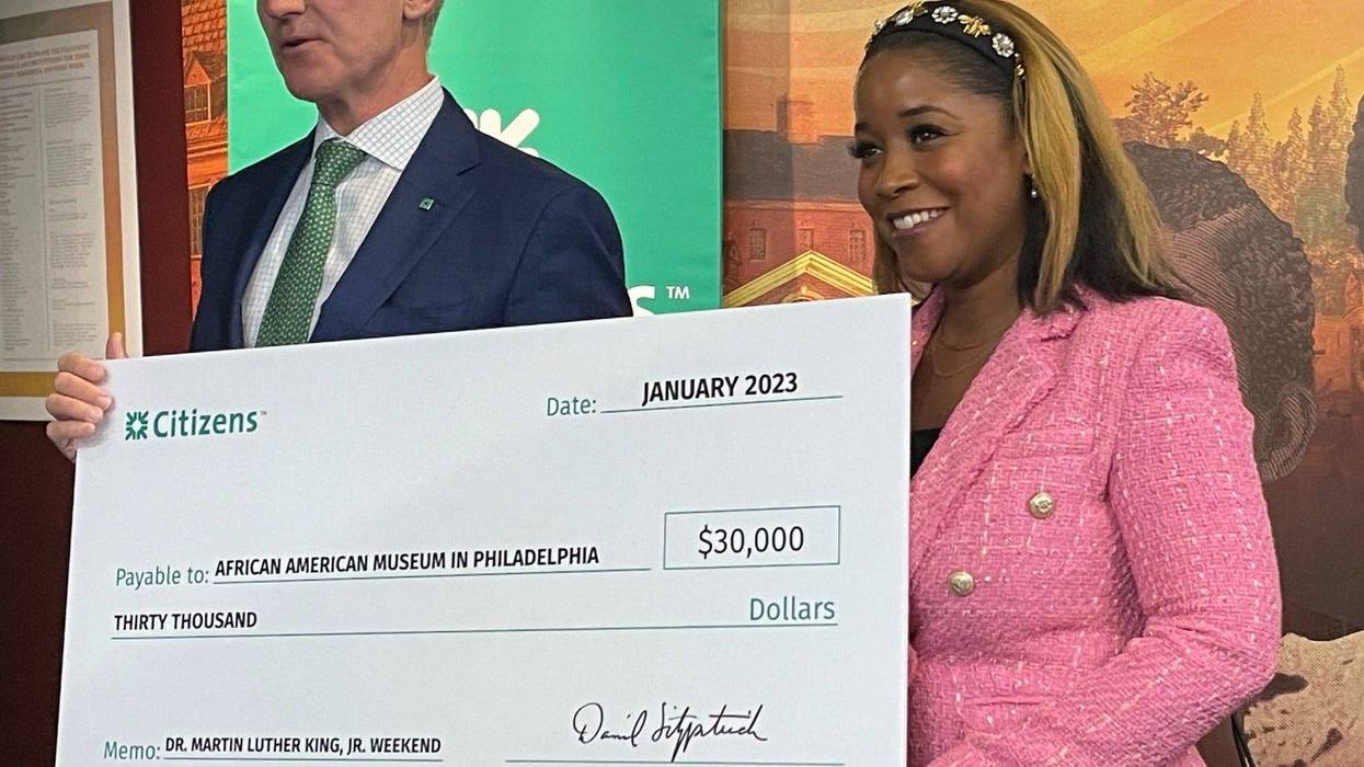 Citizens Mid-Atlantic President Daniel Fitzpatrick (left) presents a $30,000 check to African American Museum in Philadelphia President and CEO Ashley Jordan, to support the museum's MLK weekend programming.