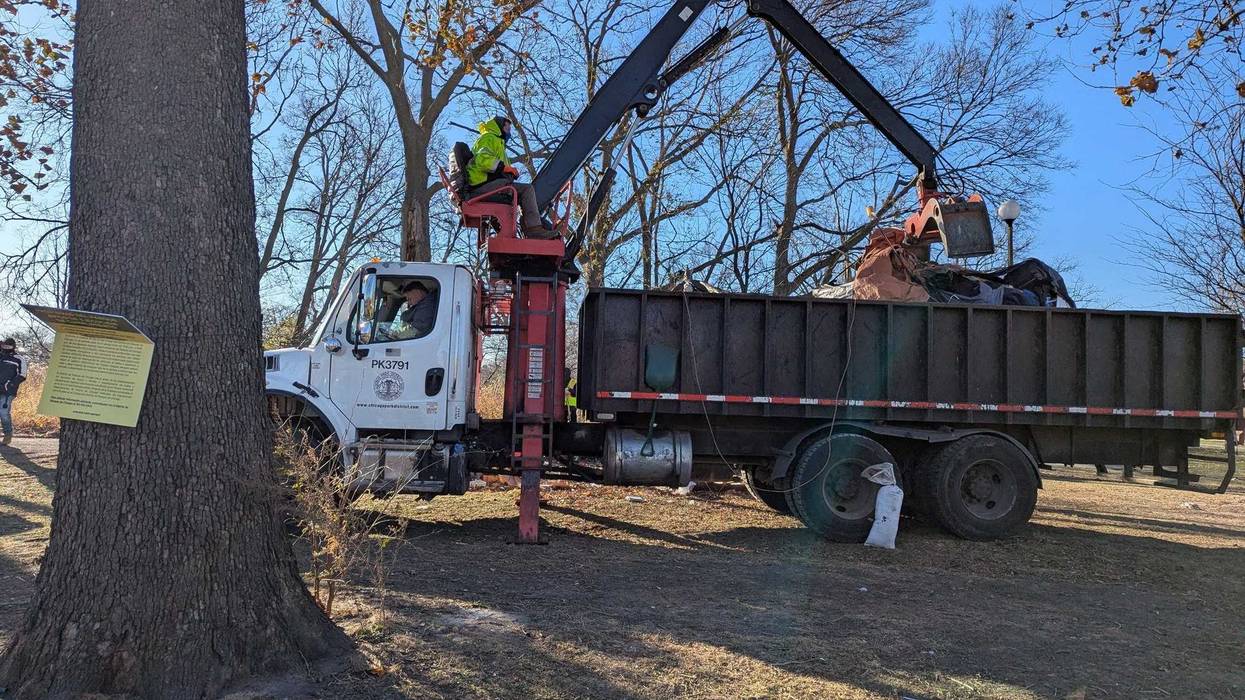 City of Chicago truck removes tent from Humboldt Park