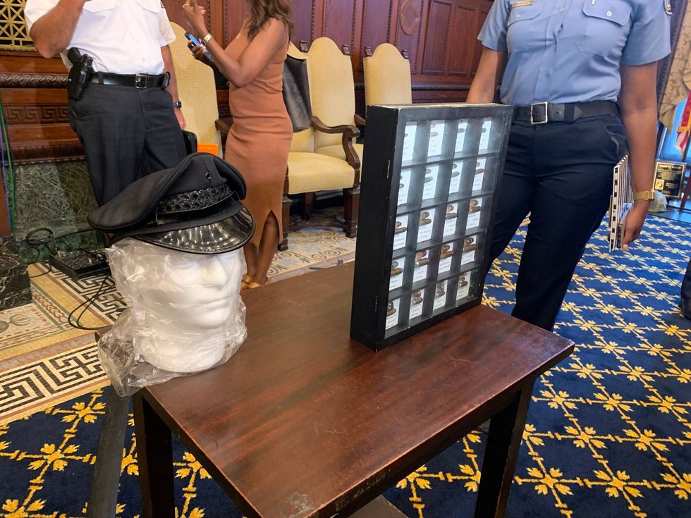 City officials describe the trajectory of the bullet that struck Philadelphia Police Officer Sergio Diggs and was later found lodged inside his hat.