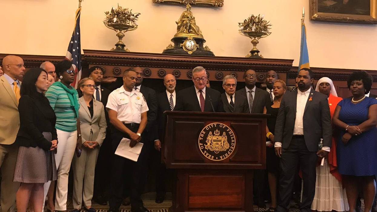 City, state and federal officials speak from Philadelphia City Hall about the shooting incident on Wednesday.