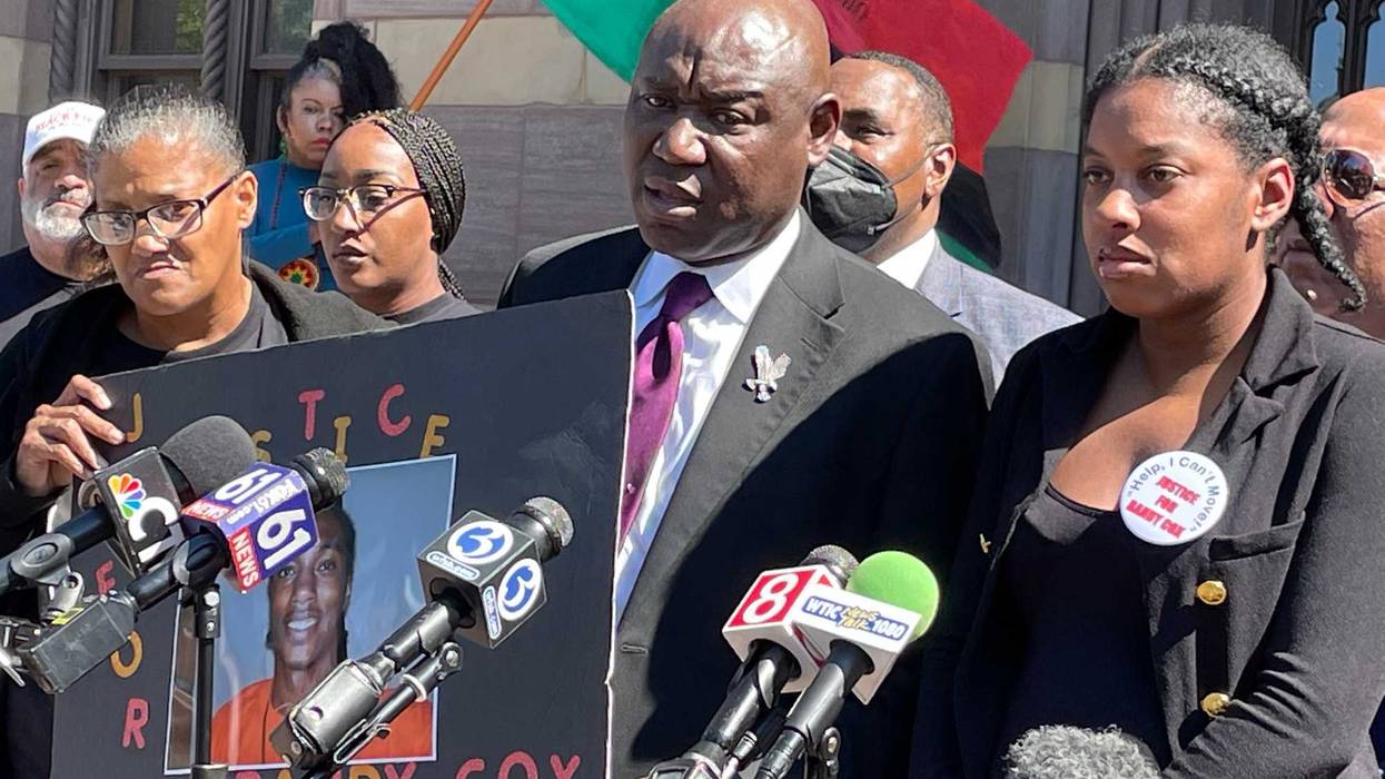 Civil rights attorney Benjamin Crump with Doreen Coleman and LaToya Boomer, the mother and sister of Randy Cox, in New Haven, 9/15/22