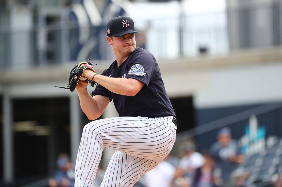 Clarke Schmidt throws live BP at Yankees spring training.