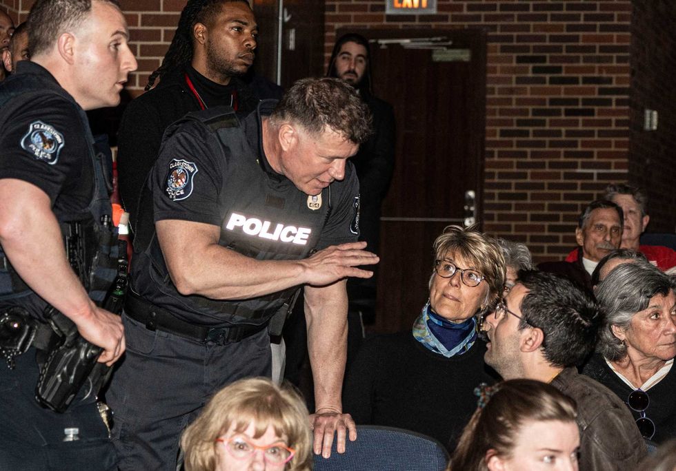 Clarkstown police remove an attendee during a town hall event held by U.S. Rep. Mike Lawler at Clarkstown South High School in West Nyack April 27, 2025