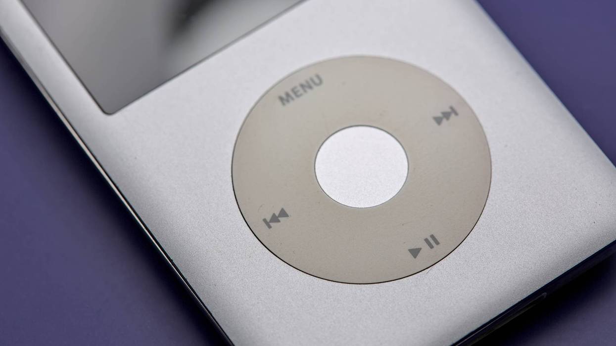 classic portable mp3 player on a blue background.