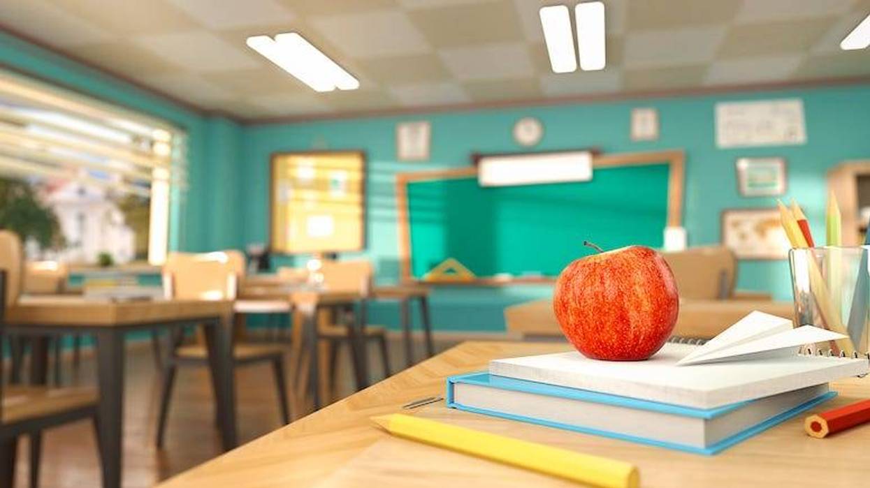 Classroom with apple on desk