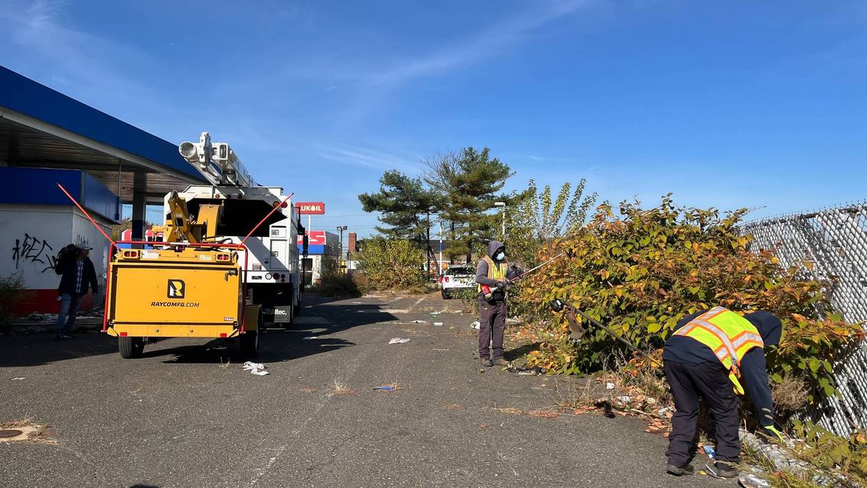 Cleanup crews begin the cleanup process at the old U.S. Petroleum station along Admiral Wilson Boulevard in Camden.