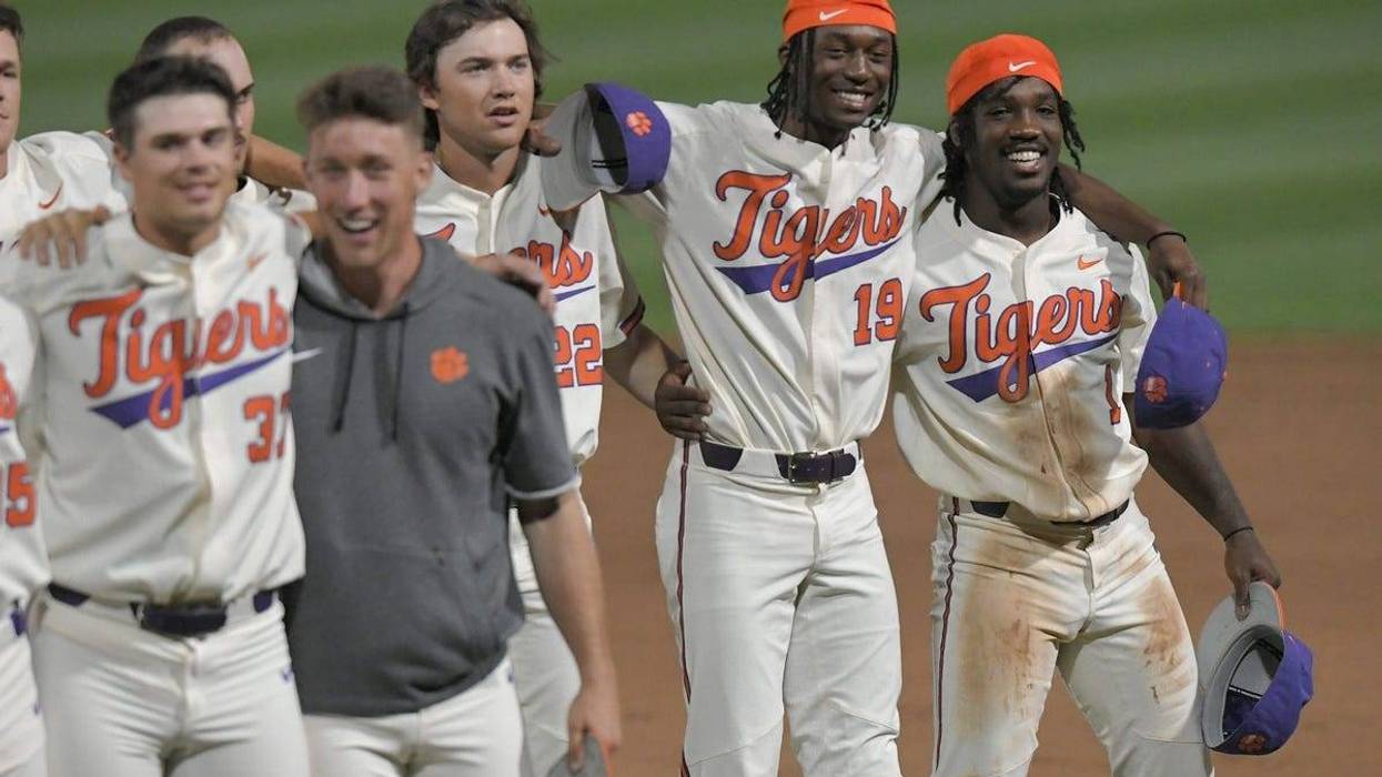 Clemson players join in the alma mater after the Tigers beat South Carolina 7-2 at Doug Kingsmore Stadium in Clemson Tuesday, May 11,2021. Clemson Baseball Vs University Of South Carolina May 11