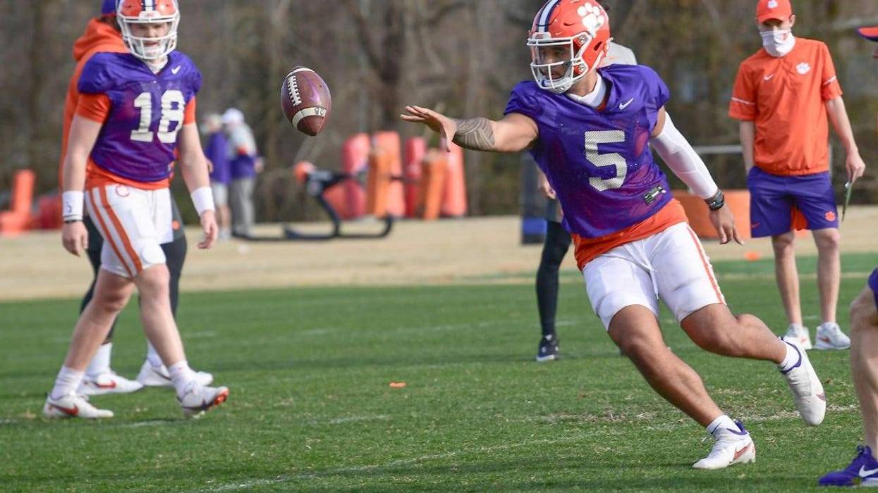 Clemson quarterback D.J. Uiagalelei(5) pitches a ball during football practice in Clemson, S.C. Friday, March 5, 2021
