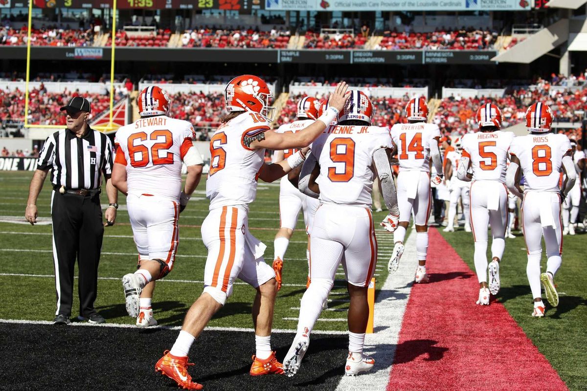 Clemson quarterback Trevor Lawrence and running back Travis Etienne