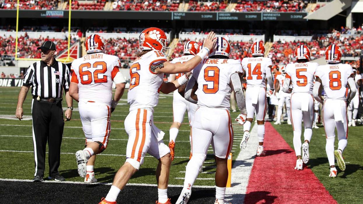 Clemson quarterback Trevor Lawrence and running back Travis Etienne