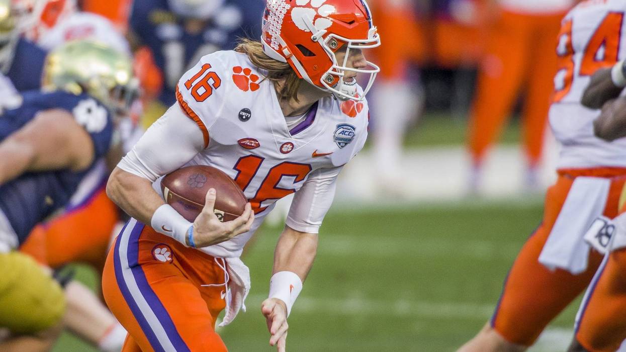 Clemson s Trevor Lawrence (16) runs the ball during the ACC Championship football game on Saturday, Dec. 19, 2020, inside Bank of America Stadium in Charlotte, NC.