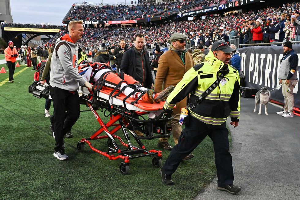 Cleveland Browns cornerback Troy Hill is wheeled off of the field after sustaining an injury during the second half of a game against the New England Patriots at Gillette Stadium.