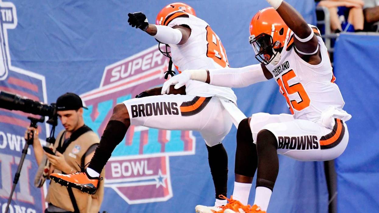 Cleveland Browns' David Njoku (85) celebrates with Rashard Higgins (81) after scoring a touchdown during the first half of a preseason NFL football game against the New York Giants, Thursday, Aug. 9, 2018, in East Rutherford, N.J.