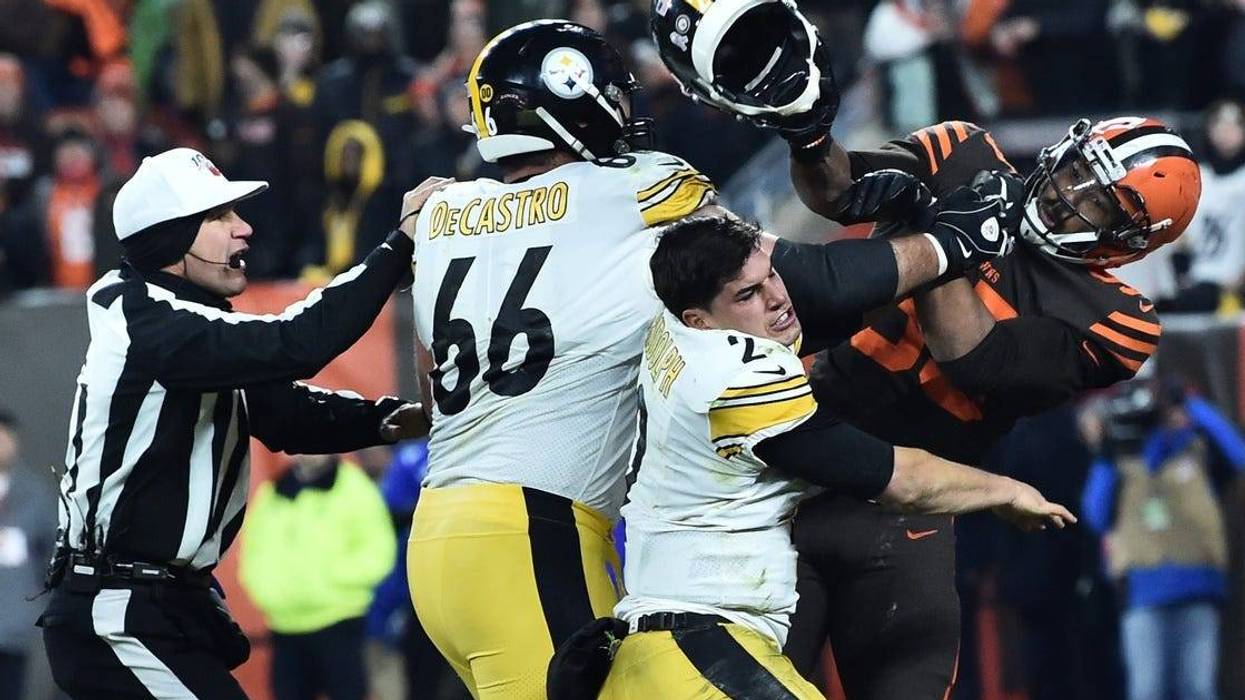Cleveland Browns defensive end Myles Garrett (95) hits Pittsburgh Steelers quarterback Mason Rudolph