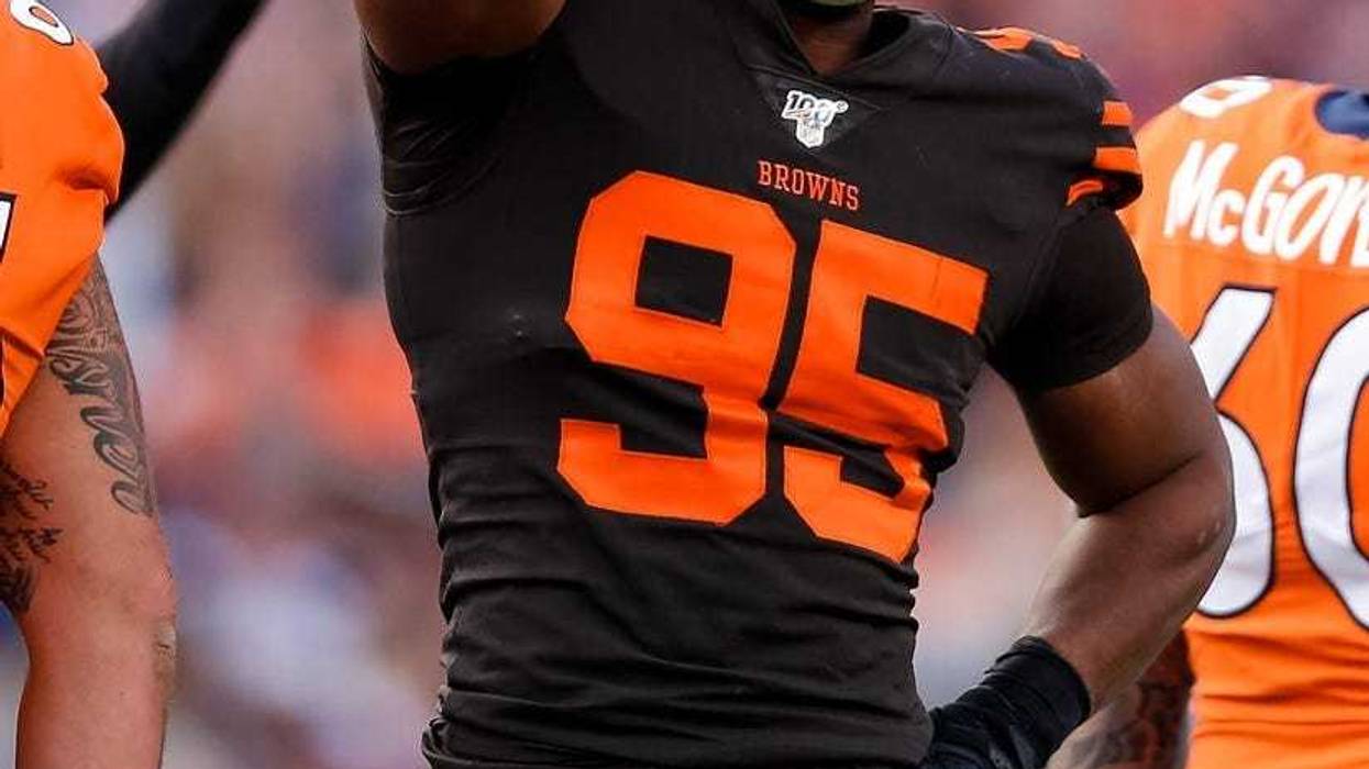 Cleveland Browns defensive end Myles Garrett (95) reacts after a play in the second quarter against the Denver Broncos at Empower Field at Mile High.