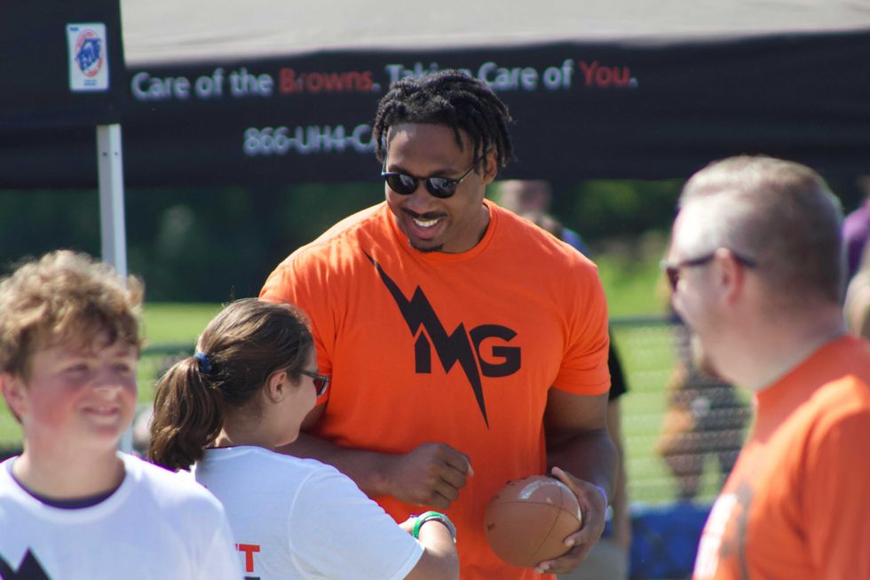 Cleveland Browns defensive end Myles Garrett offers instruction at his Pro Camp held at Gilmour Academy in Gates Mills, Ohio on June 11, 2022
