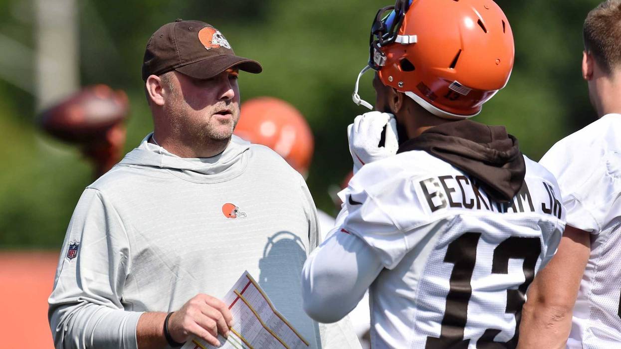Cleveland Browns head coach Freddie Kitchens talks with wide receiver Odell Beckham (13) during training camp at the Cleveland Browns Training Complex.