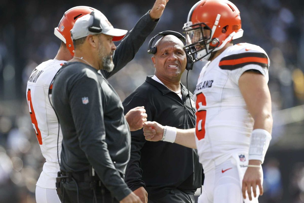 Cleveland Browns head coach Hue Jackson stands on the sideline after a Browns touchdown against the Oakland Raiders in the second quarter at Oakland Coliseum.